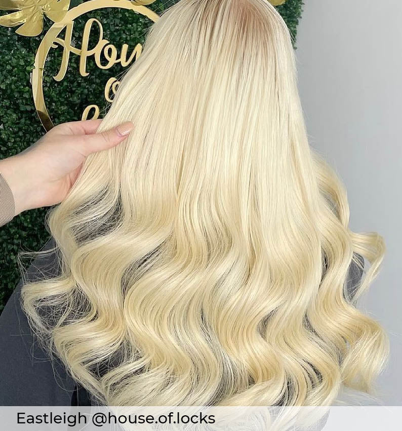 Long platinum blonde hair, curly bright blonde hair with micro ring hair extensions adding length volume by Viola hair extensions