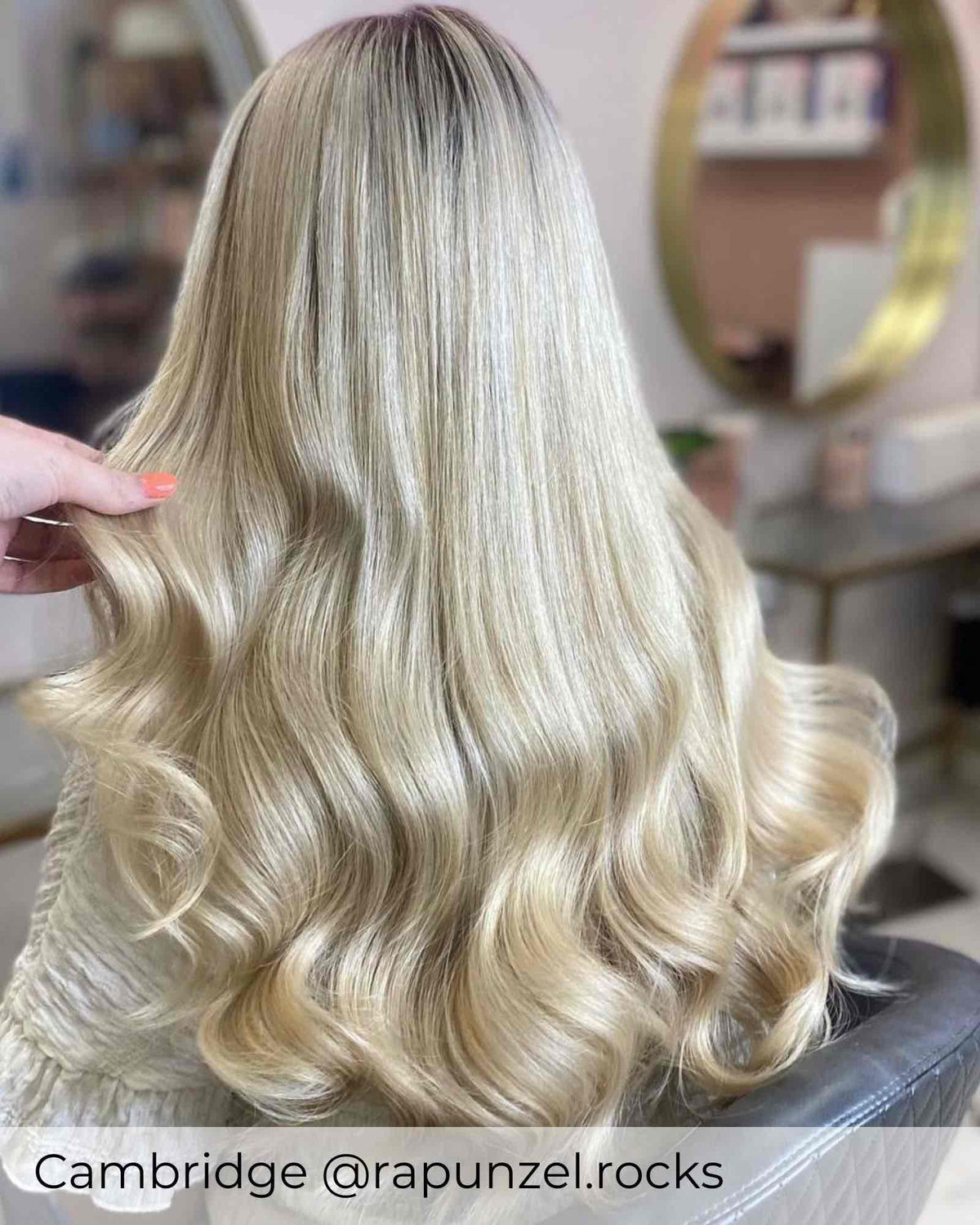 Blonde Balayage hair, wearing Viola tape in hair extensions in shade Malibu Sunset bright blonde mix hair extensions