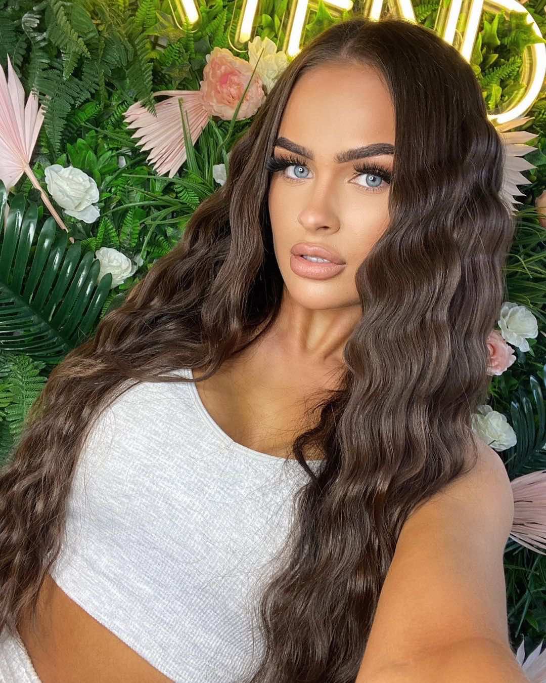 Chocolate brown hair enhanced by adding Viola pure cocoa human hair pre-bonded extensions to add length and volume