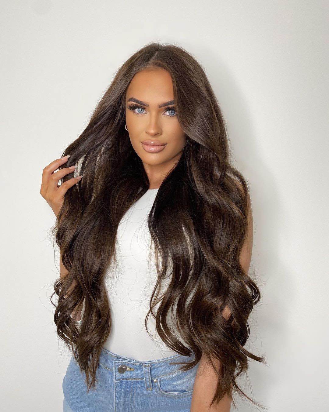Chocolate brown hair enhanced by adding Viola pure cocoa human hair micro ring extensions to add length and volume