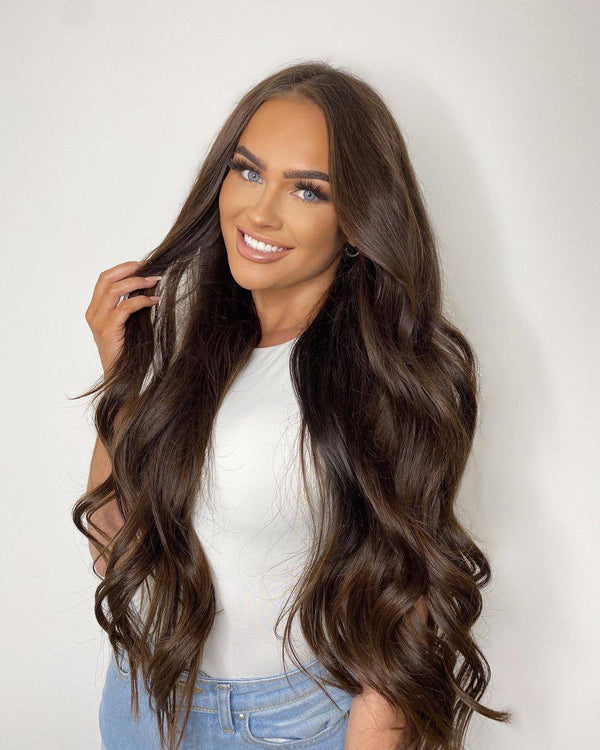 Dark brown hair enhanced by adding Viola pure cocoa human hair tape in extensions to add length and volume to short brown hair