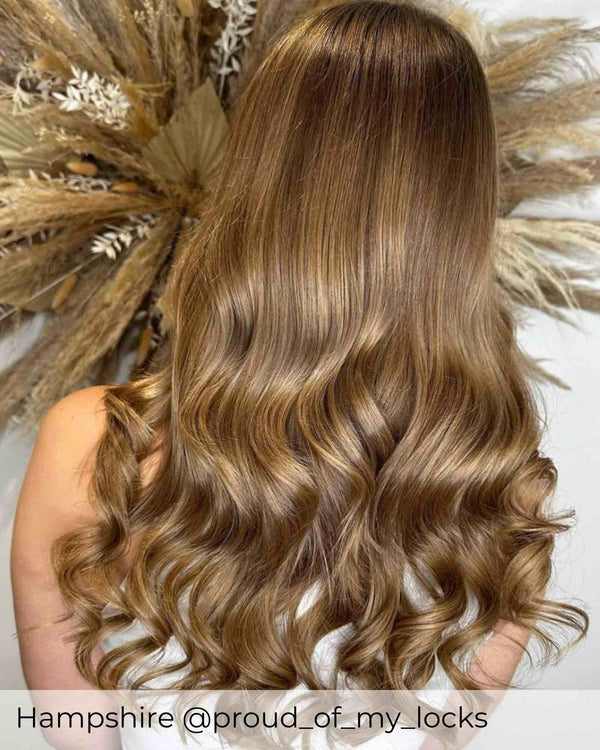 Beautiful brown hair extensions added length and volume to short hair with tape in human hair extensions by Viola
