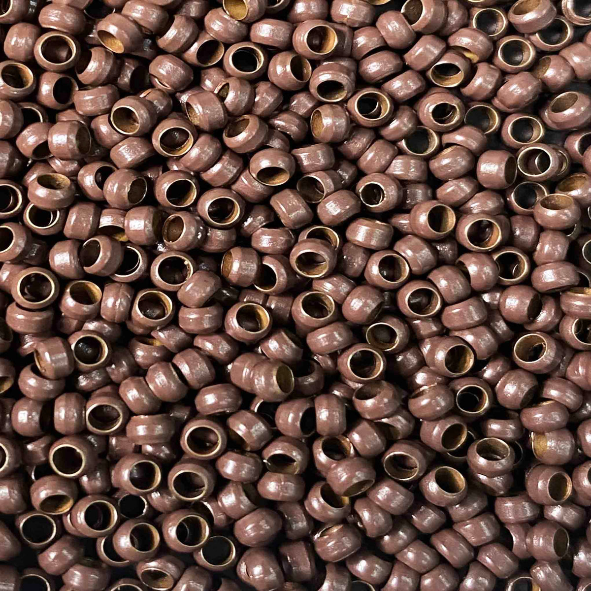 Light brown Nano bonds rings for use with nano tip hair extensions by Viola