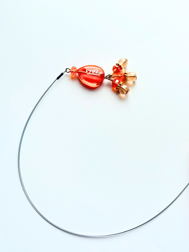 Orange Nano ring application tool by Viola.