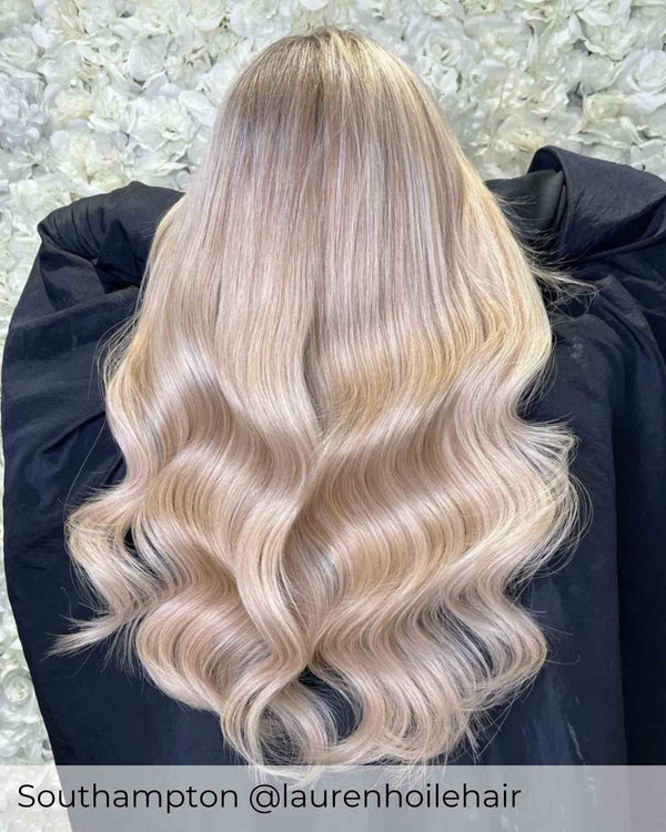 Blonde Balayage hair, wearing Viola Nano ring hair extensions in shade Scandinavian blonde mix hair extensions 