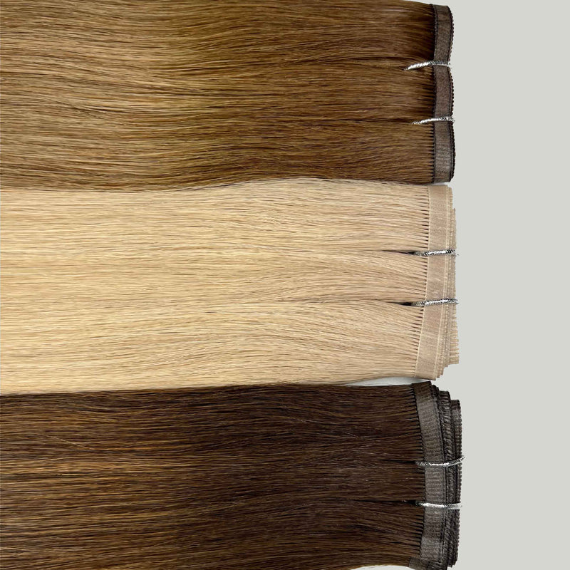 Human tape weft hair extensions UK available in #T4P4/14 balayage medium brown dark blonde mix caramel cappuccino