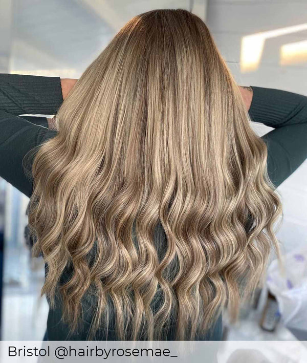 Balayage ash brown root and bright ash blonde mix hair extensions, mixed extensions with a brown root by Viola hair extensions UK