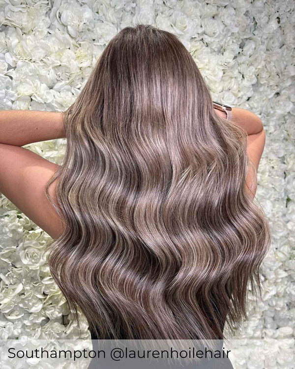 Balayage ash brown blonde hair extensions with a blend of brown and ash blonde highlighted human hair extensions by Viola