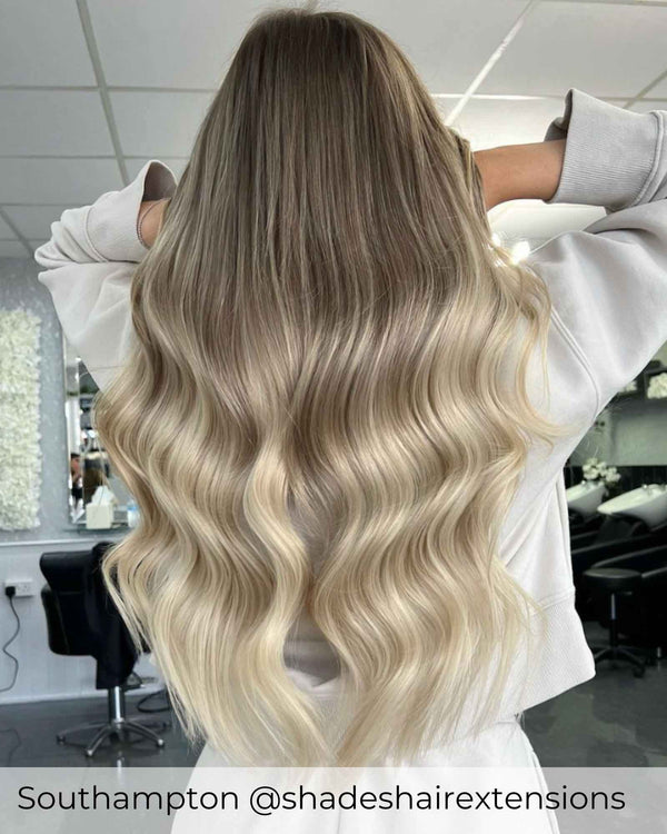 Light brown root stretch to ash blonde hair extensions, long beautiful hair achieved with root drag brown hair extensions