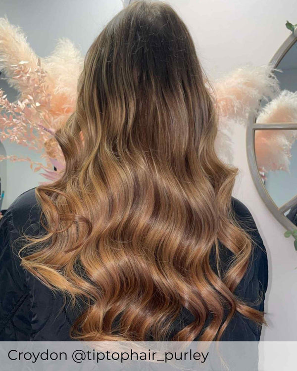 Balayage dark brown root and honey blonde mix hair extensions, mixed extensions with a brown root by Viola hair extensions UK