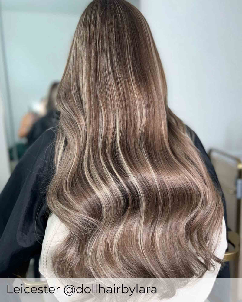 Balayage dark brown root and platinum blonde mix hair extensions, mixed extensions with a brown root by Viola hair extensions UK