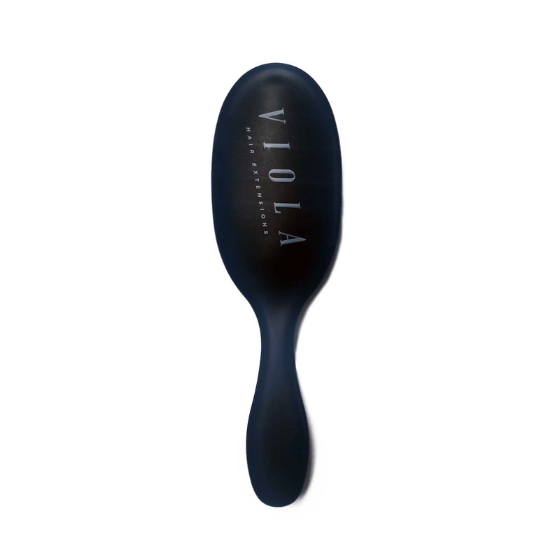 Black oval bristle brush for all hair extensions methods by Viola