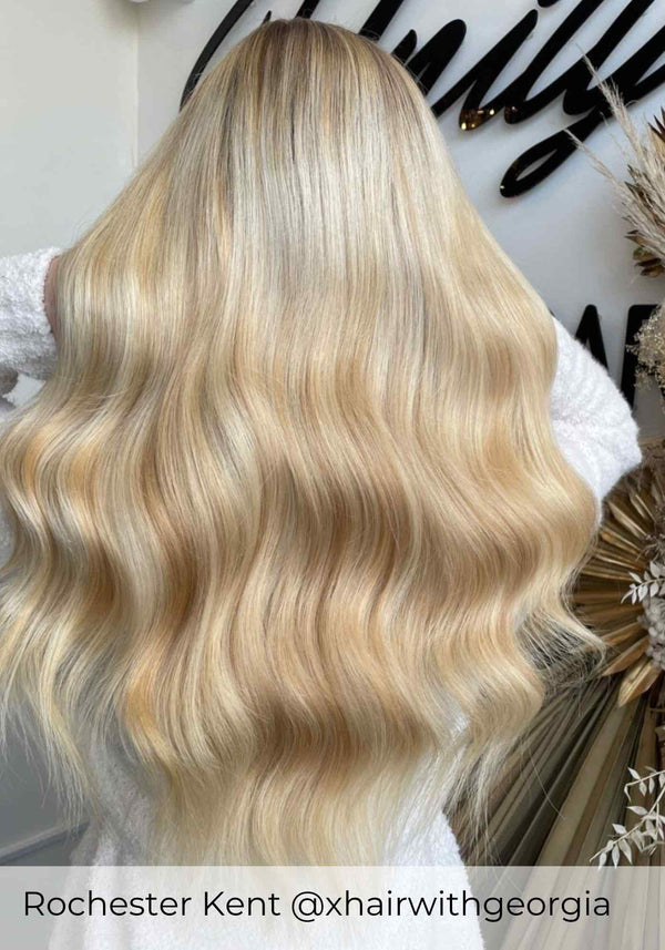 Blonde Balayage hair, wearing Viola Nano ring hair extensions in shade Dubai dusk warm blonde mix hair extensions 