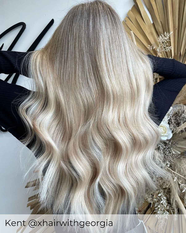 Blonde Balayage hair, wearing Viola pre-bonded hair extensions in shade Malibu Sunset bright blonde mix hair extensions 