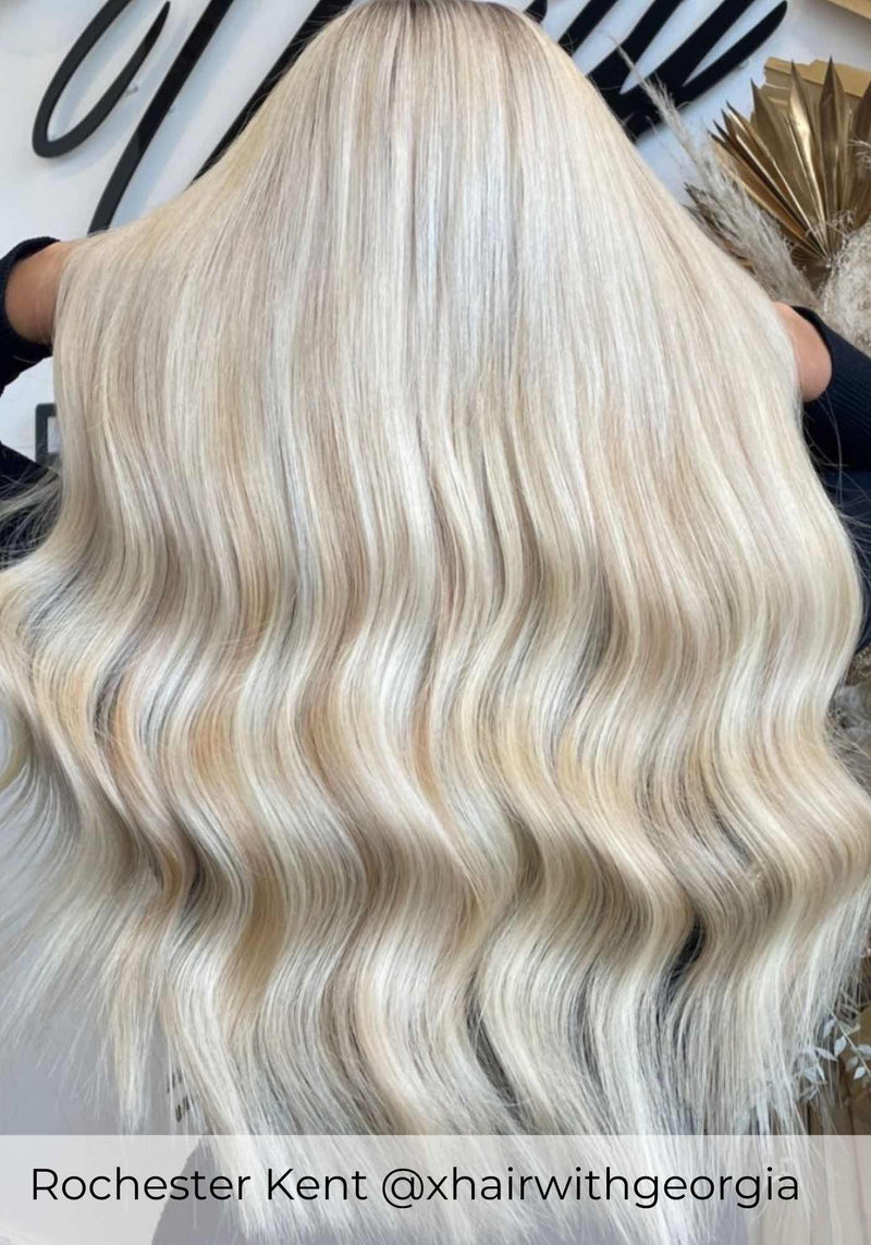 Blonde Balayage hair, wearing Viola weave hair extensions in shade Malibu Sunset bright blonde mix hair extensions 