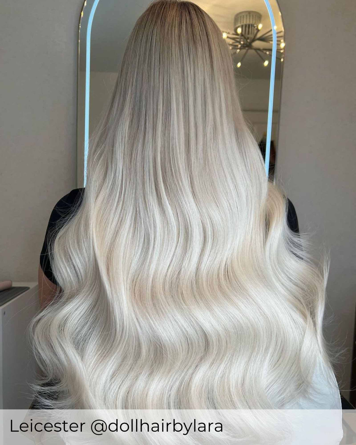 Long white platinum blonde hair, curly bright blonde hair with pre-bonded hair extensions adding length volume by Viola hair extensions