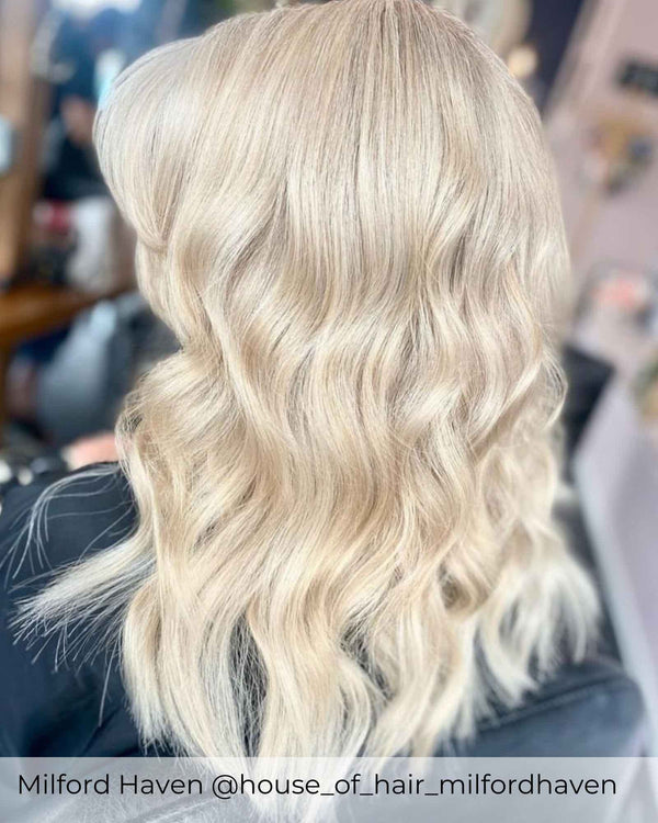 Mixed light ash blonde hair extensions with ash blonde blended with ash dark blonde to create light Balayage mix extensions by Viola 