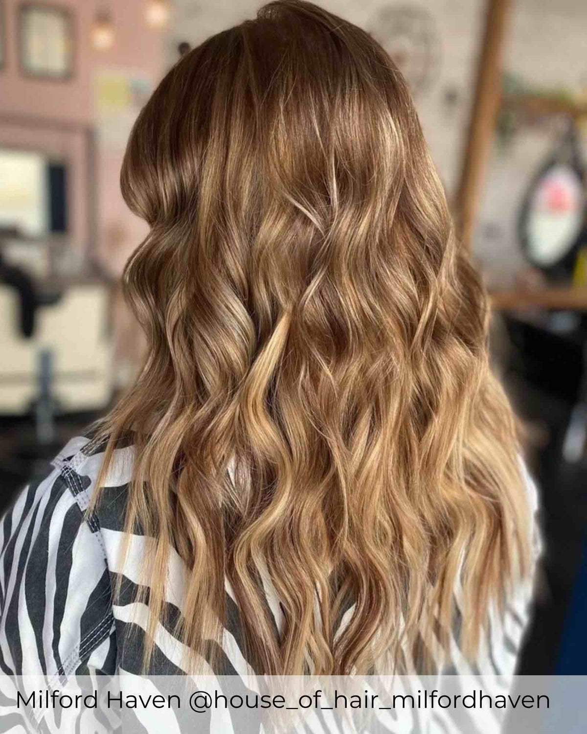 Balayage brown hair extensions with a blend of dark brown and honey blonde highlighted human hair extensions by Viola