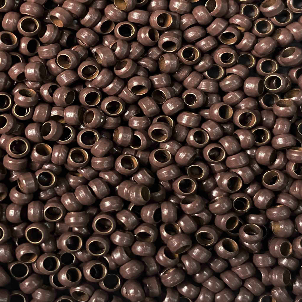 Brown Nano bonds rings for use with nano tip hair extensions by Viola