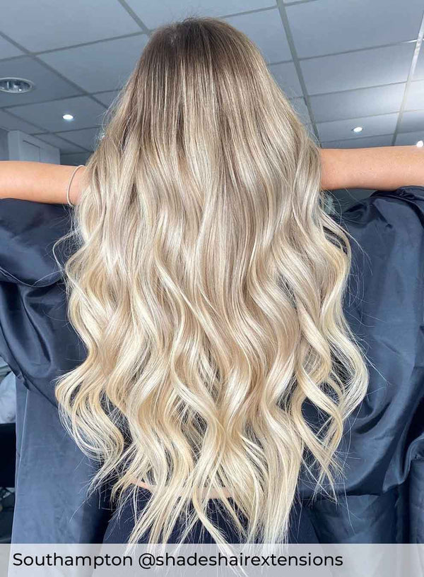 Root Stretch warm brown to ash blonde hair achieved with Viola human hair extensions, brown blending into sandy blonde hair