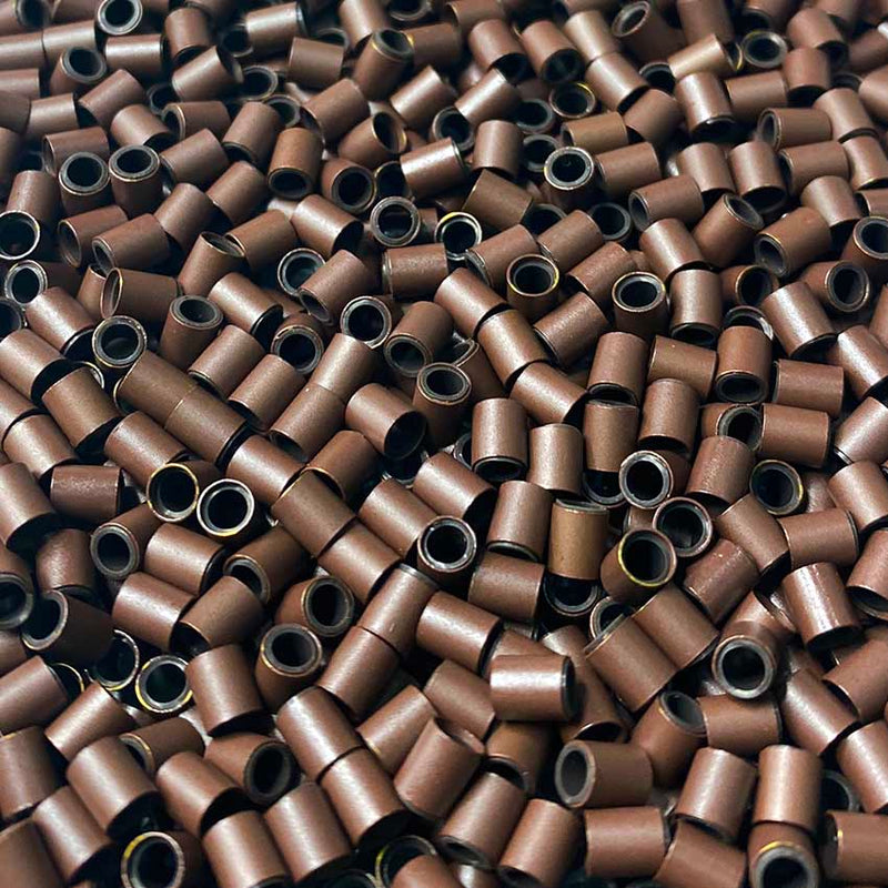 Brown Silicone lined copper tubes for hair extensions by Viola