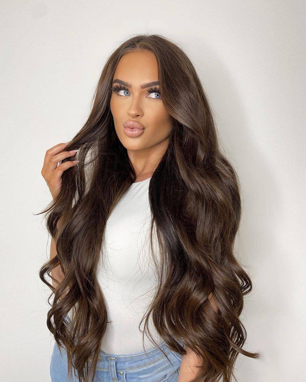Chocolate brown hair enhanced by adding Viola pure cocoa human hair tape weft extensions to add length and volume 