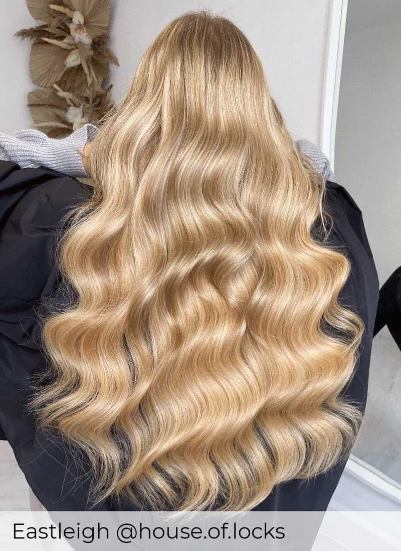 Golden blonde hair wearer achieved by having Viola micro ring human hair extensions, to create a natural blend long hair