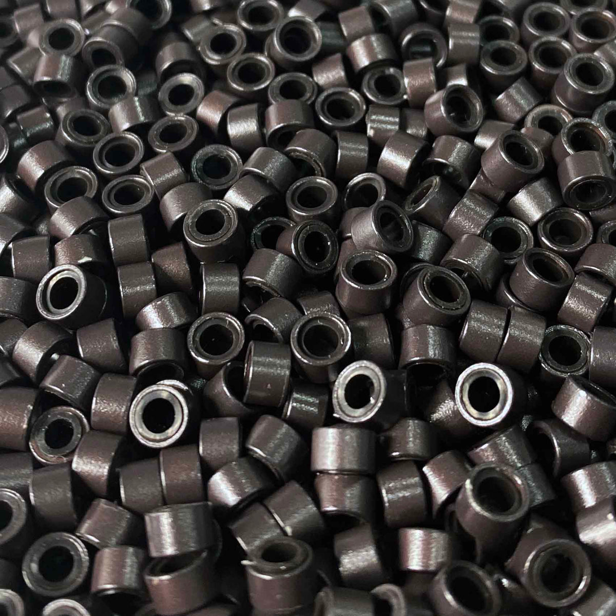 Dark brown Silicone lined micro rings for hair extensions by Viola