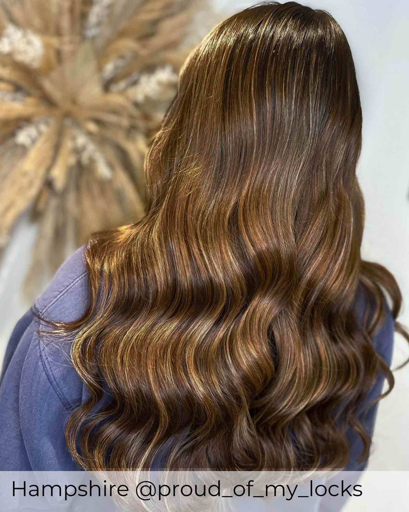 Balayage brown hair extensions with a blend of warm brown and dark brown highlighted human hair extensions by Viola