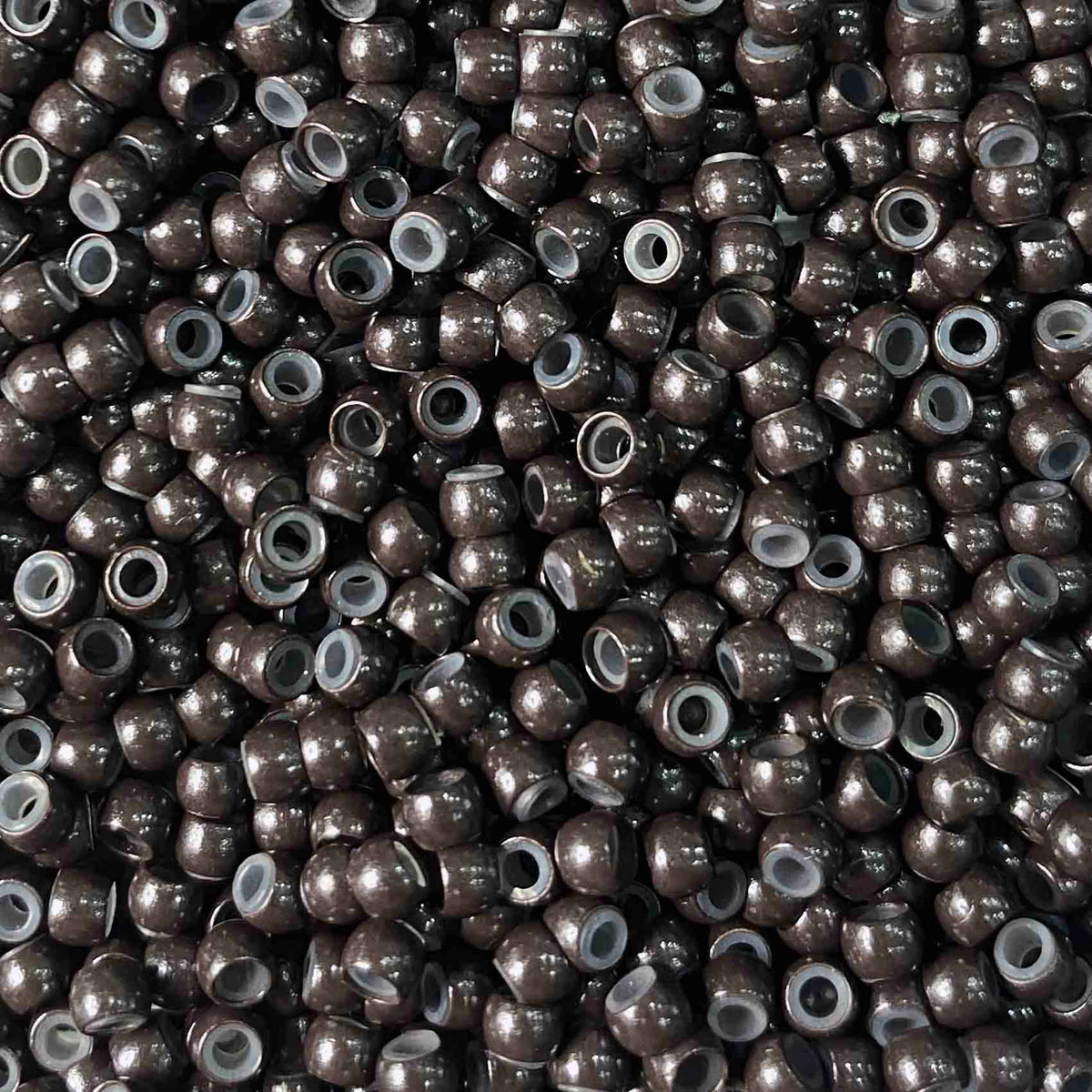 Dark brown Silicone lined nano rings for hair extensions by Viola