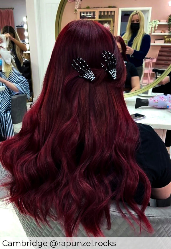 Dark plum hair, achieved with Viola bold, beautiful, red hair extensions pre-bonded adding length and volume to plum hair