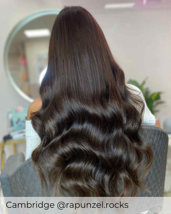 Darkest brown hair enhanced by adding Viola chard earth human hair tape in extensions to add length and volume to short black hair