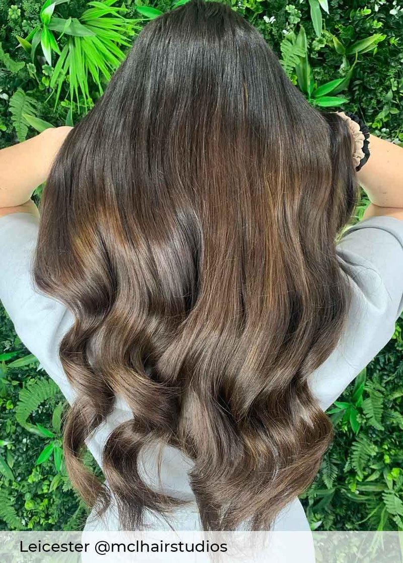 ash brown hair wearer achieved by having Viola nano ring human hair extensions, to create a natural blend long hair