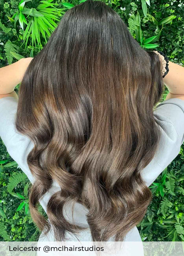 Ash brown hair, long, healthy, brown tape in hair extensions by Viola wearing colour #7 frosted Chocolate 