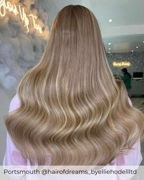 Balayage light brown blonde hair extensions with a blend of brown and ash blonde highlighted human hair extensions by Viola