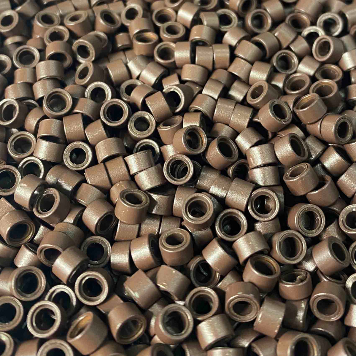 Light brown Silicone lined micro rings for hair extensions by Viola