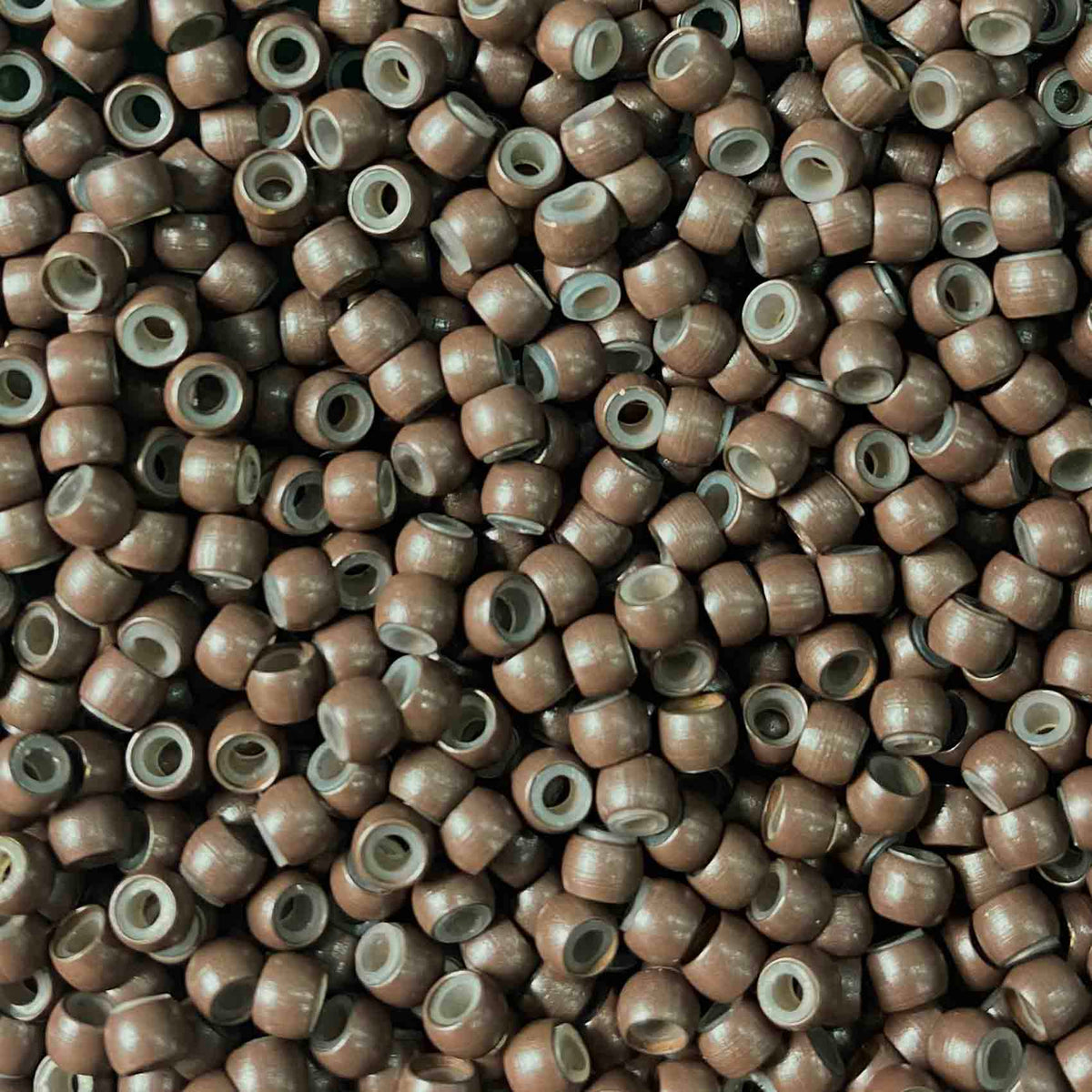 Light brown Silicone lined nano rings for hair extensions by Viola