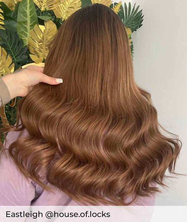 Medium brown hair, long, healthy, brown tape in hair extensions by Viola wearing colour #4 Milk Chocolate 