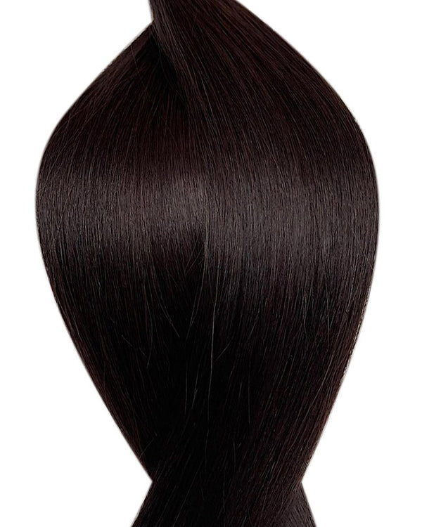 Human Seamless clip-in hair extensions UK available in #1B off black treacle