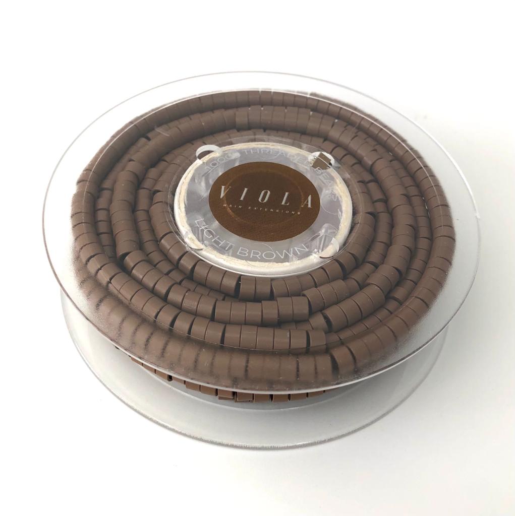 Pre-loaded micro rings 4.5mm light brown.